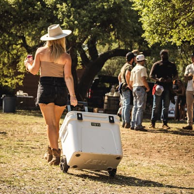 YETI Roadie® 60 Wheeled Cooler 220022 Roadie 48 60 Campaign PDP Lifestyle 1024x1024 10 yeticoolershop.com