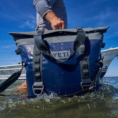 YETI Hopper® M30 Tote Soft Cooler PDP Overview Image Lifestyle New M30 Ultra Durable Inline Navy 1x YETI Cooler Shop