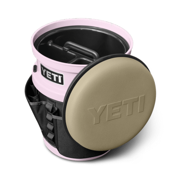 The Fully-Loaded Bucket  With Tan Swivel Seat Site Studio Outdoor Living Loadout Bucket Swivel Seat Tan on Cherry Blossom 3qter Loaded 10527 B 2400x2400 YETI Cooler Shop