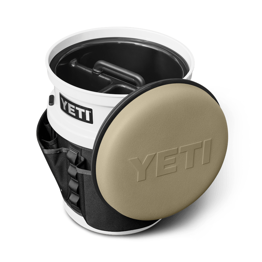 The Fully-Loaded Bucket With Tan Swivel Seat Site Studio Outdoor Living Loadout Bucket Swivel Seat Tan on White 3qter Loaded 10527 B 2400x2400 YETI Cooler Shop