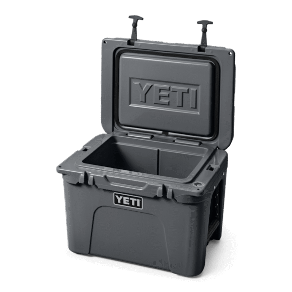 YETI Tundra® 35 Hard Cooler W 220078 1H23 Color Launch site studio Hard Coolers Tundra 35 Charcoal 3qtr Lid Up 3436 Primary B 2400x2400 yeticoolershop.com