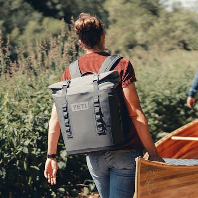 YETI Hopper® M12 Backpack Soft Cooler W 22014 PDP Product Overview Lifestyle M12 P1 2x yeticoolershop.com