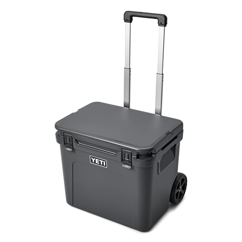 Detail of the NeverFlat Wheels and StrongArm Handle on the yeti 60 wheeled cooler for easy transport.