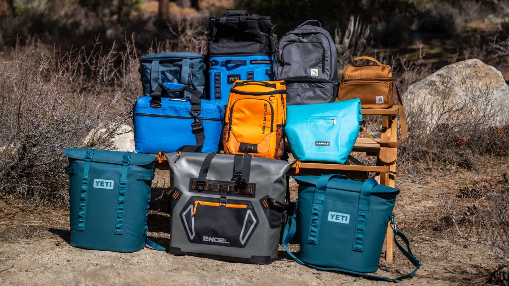 Portable YETI soft coolers from the online gear store sitting on a beach