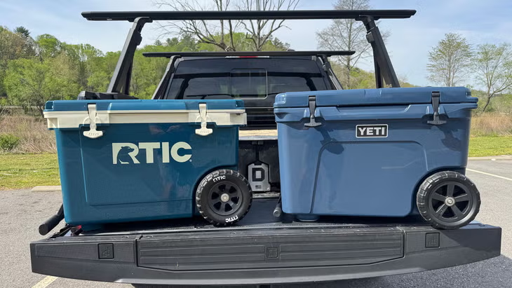 YETI hard cooler on a truck bed at a campsite from the yeti store online