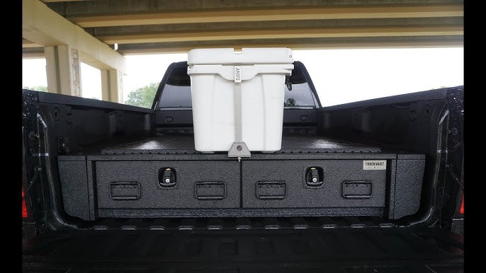 A rugged gray YETI cooler positioned for a camping trip showing its durable finish