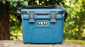 Durable blue yeti gear hard cooler on a truck for mountain camping adventures